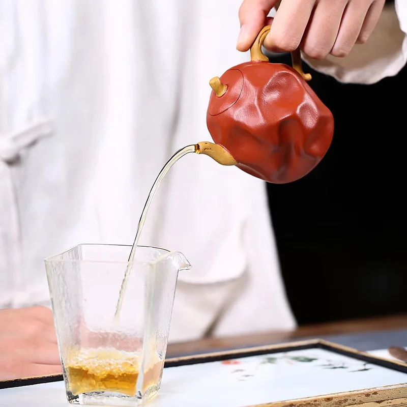 

Yixing Zisha teapot famous hand-made high-quality bionic ware jujube pot flower ware Teapot Tea Set goods