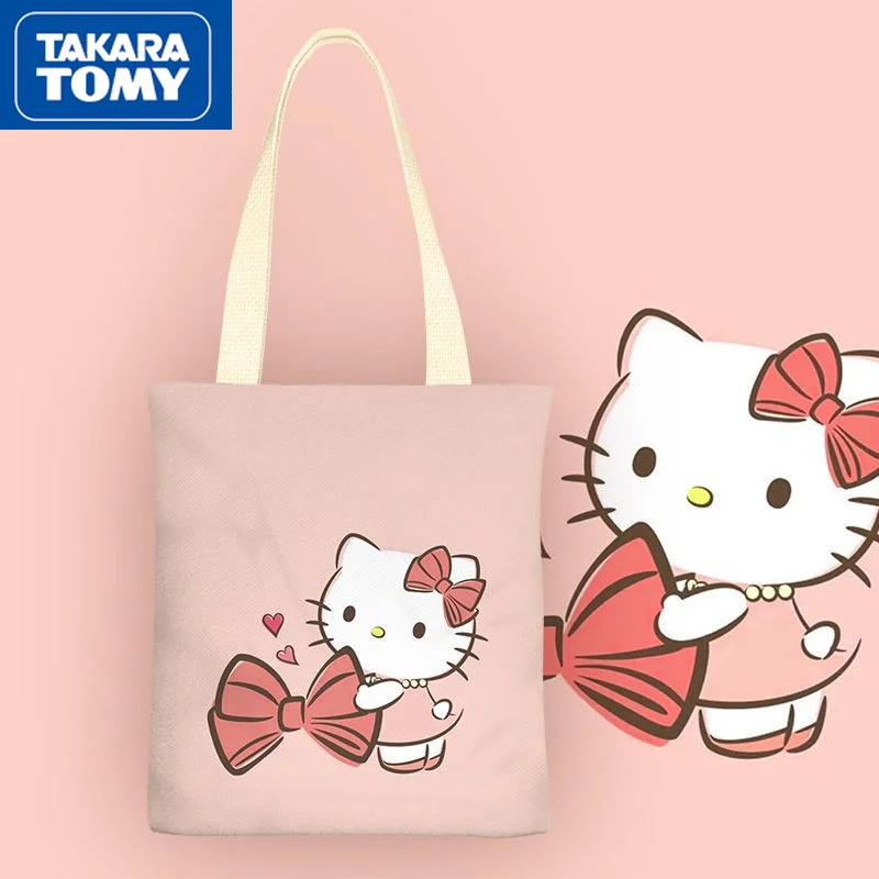 

Ms. TAKARA TOMY new 2021 small fresh canvas bag simple cartoon Hello Kitty portable student storage bag