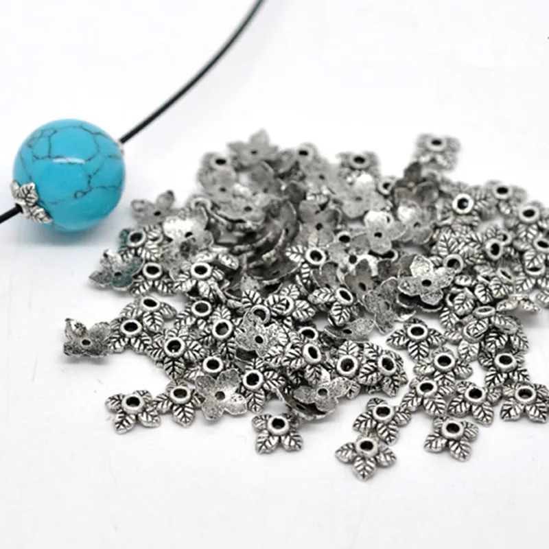 DoreenBeads 70 шт. декоративные бусины с 4 лепестками листьев Концевики ювелирные