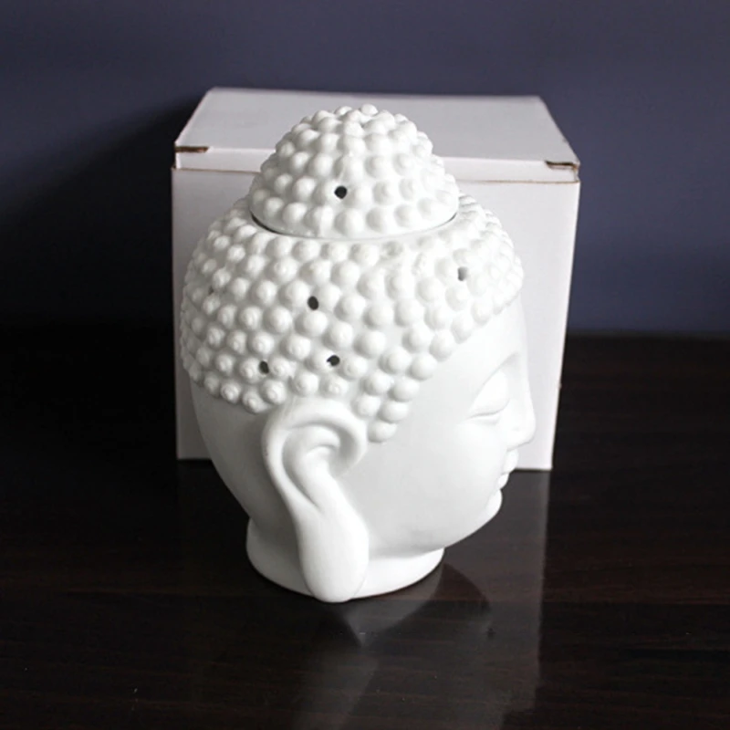 

Buddha Head Ceramic Hollow Aromatherapy Furnace Oil Candle Burner for Yoga or Meditation Room.for Yoga or Meditation Room
