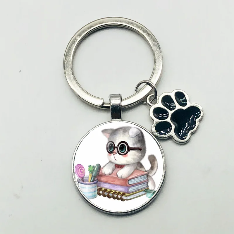 

2019 new retro cute cat keychain dog foot alloy European and American fashion popular classic key ring pendant