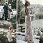 Облегающее кружевное свадебное платье с длинным рукавом и высоким воротом