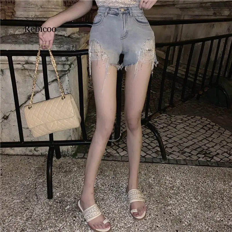 Женские джинсовые шорты с высокой талией широкие свободные дырками модные