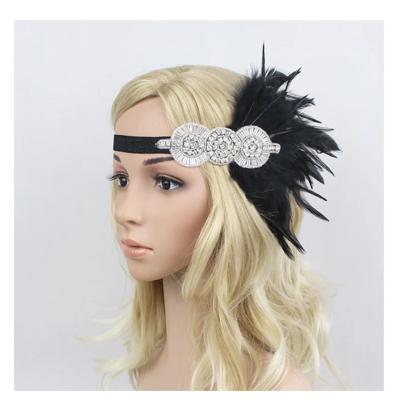 

The dark plumage of the 1920s with gold glitter headpiece and European and American Indian headpiece