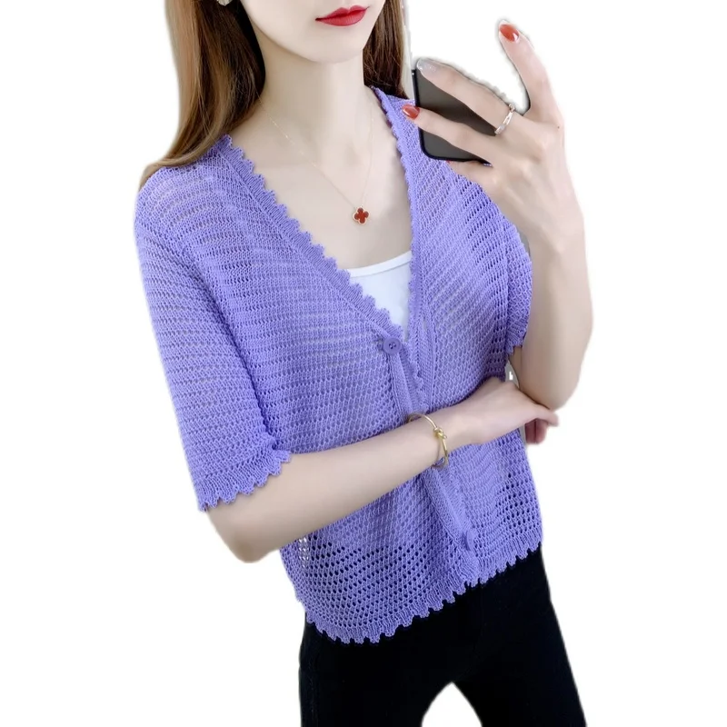 

Room 199931, 1 row 4 will hollow out the pure color on the v-neck half sleeve short cardigan 26