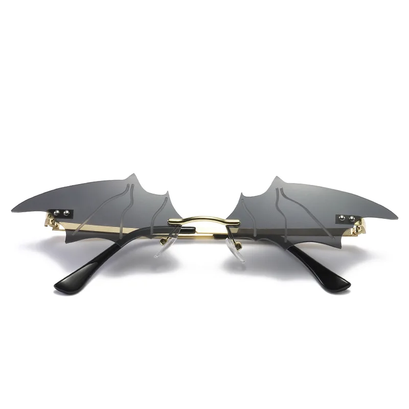 

Fashion Personality Rimless Bat Modelling Sunglasses Fashion Eyewear Newest Trendy Colorful Ocean Lenses Sun Glasses Hot UV400