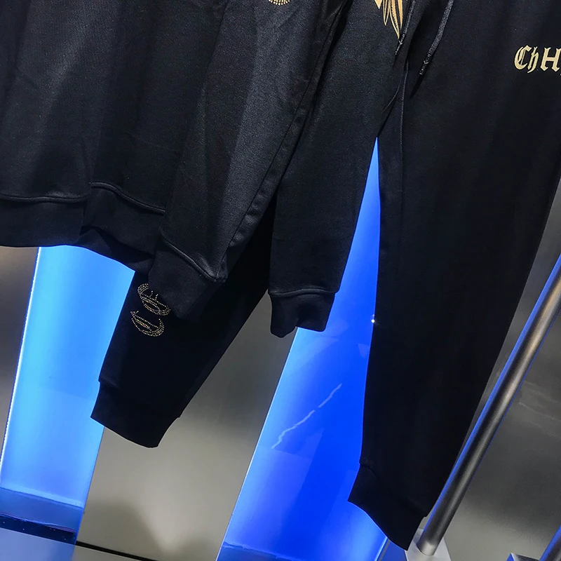 

Popular logo 2020 autumn new men's fashion suit personalized wing print ironing drill hoodie trousers two-piece suit trend