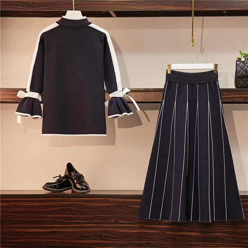 Облегающее женское платье большого размера осенне зимнее в полоску с длинным