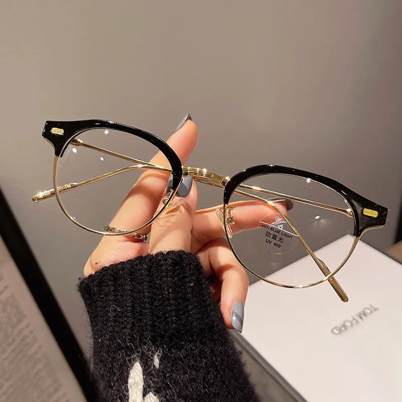 

Luxury Designer Oval Half Frame Anti Blue Light Glasses for Women Man 2022 New Office Metal Frame Trend Female Eyeglass Computer