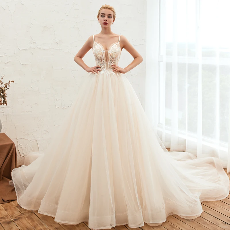 

Vestido de Noiva Princesa 2020 Spaghetti Straps Open Back Pearls Lace Appliques Elegant Bridal Gown with Train