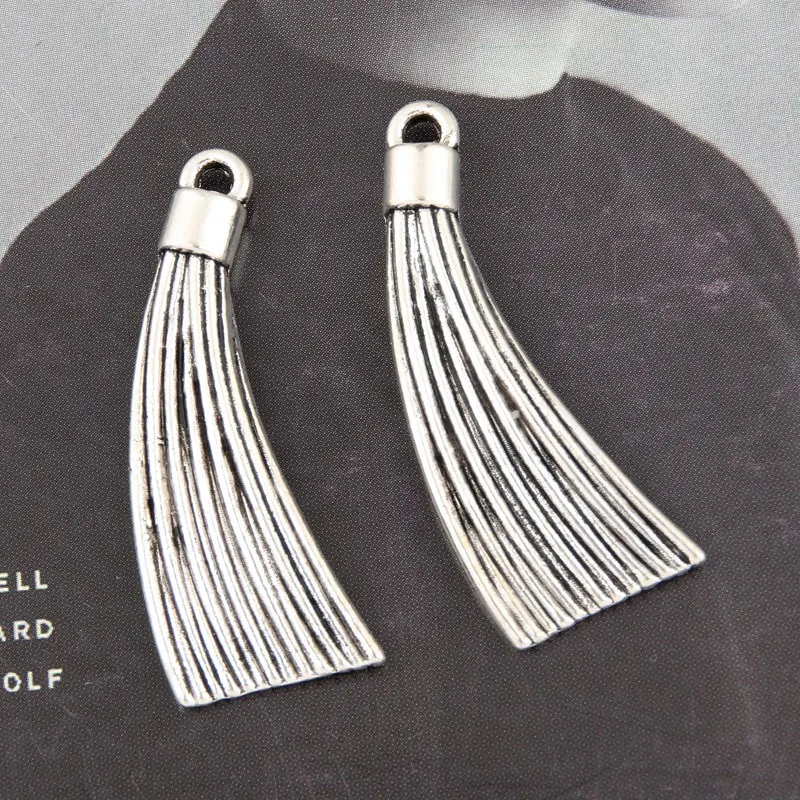 

10 шт., двусторонние подвески-кисточки серебристого цвета, 34 х13 мм