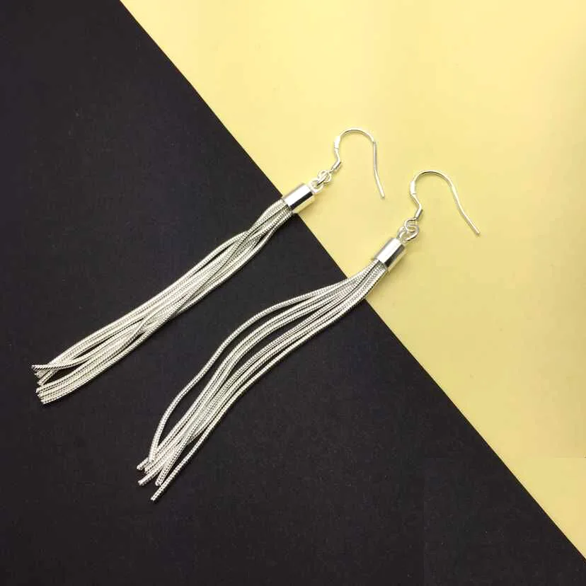 Женские длинные серьги подвески с кисточками серебристого