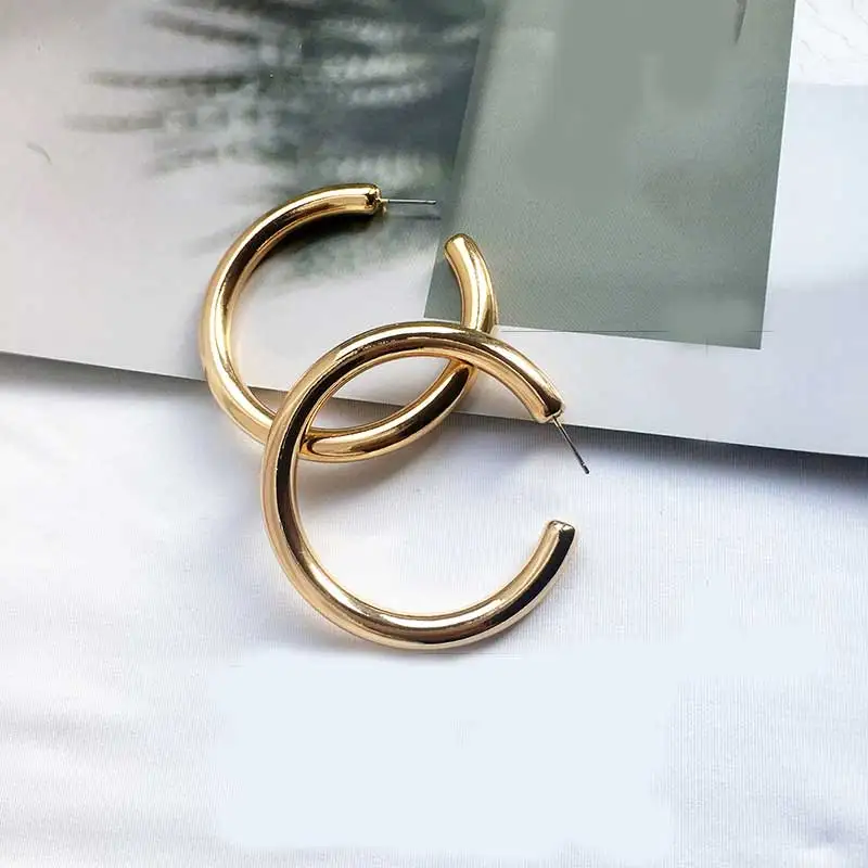 Модные массивные золотые серебряные серьги маленькие большие женские в стиле