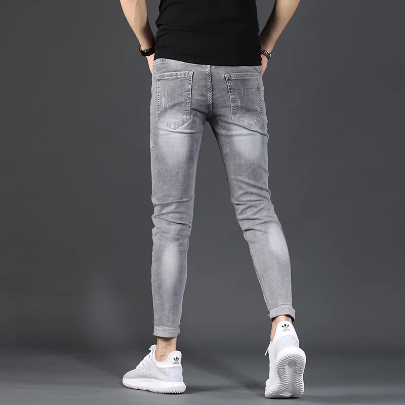 

Spring summer 2021 new men's ripped jeans Slim-fit Korean all-match small feet light-colored scratched beggar grey pencil pants