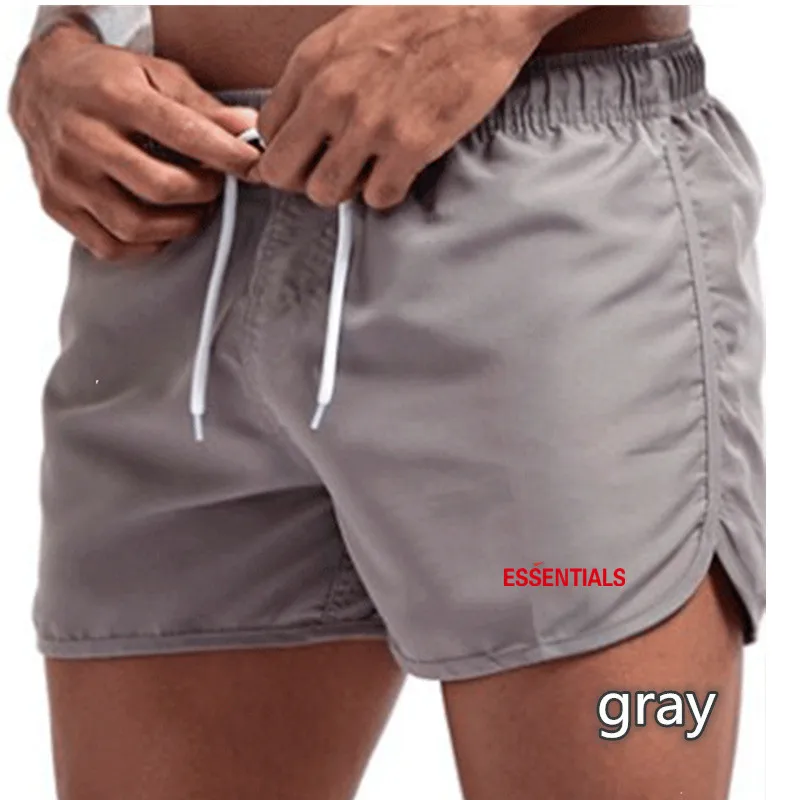 

NEW Fitness Sweatpants Shorts Man Summer Gyms Workout Male Breathable Mesh Quick dry Sportswear Jogger Beach Brand Short Pants