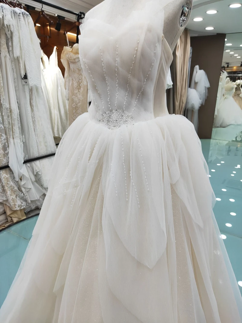 

Real Photos By FANWEIMEI Light Champagne Strapless V-Neck Sleeveless Backless Sparkle Fabric Tiered Wedding Dress Bride Gown