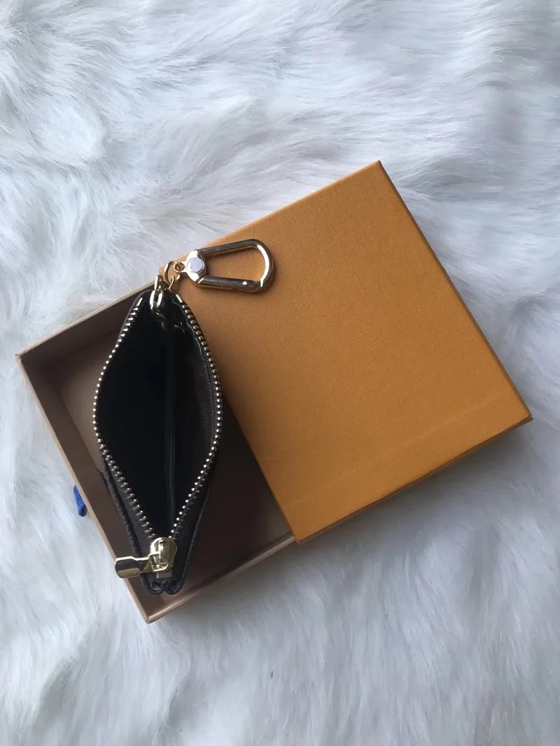 

Genuine Leather Men Women Mini Coin Purse Luxury Designer Key Pouch Pochette Cles Wallet Ship with Brand Orange Box