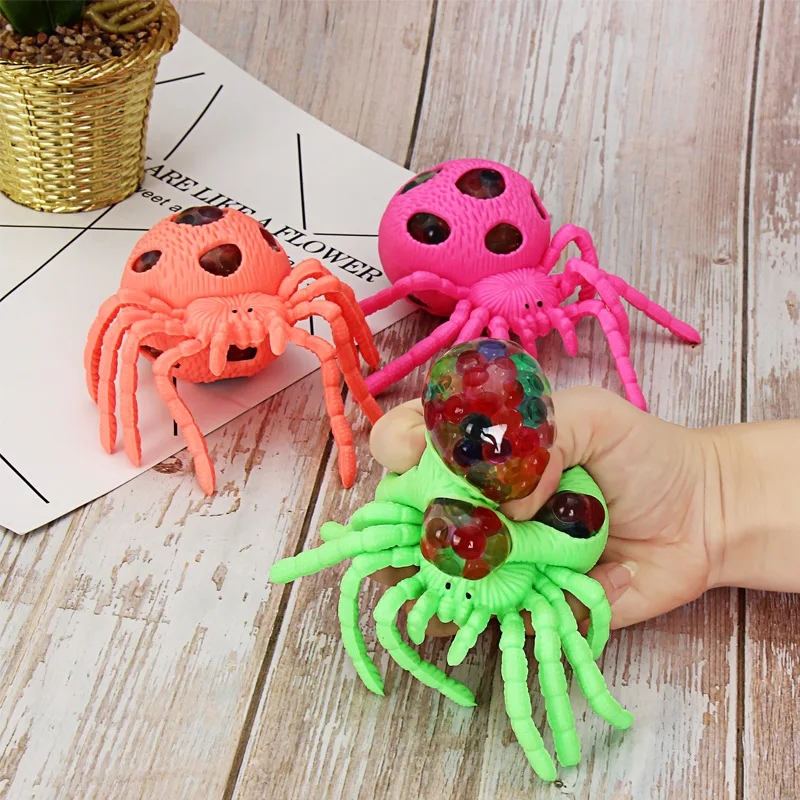 

Adult Children's Tricky Toy stress ball Decompression Artifact Pinch Music Grape Ball Vent Spider Gold Powder Vent Ball