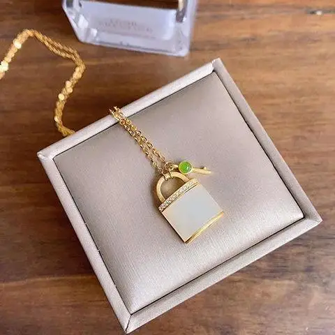 

Jade Necklace Women's Small and Simple Elegant Natural Hotian Jade Pendant Small Square Brand Silver Inlaid Small Lock Key Cla