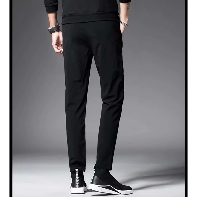 

Summer new style comfortable thin men's sports pants, men's casual pants, Korean version of elastic feet quick-drying pants, str
