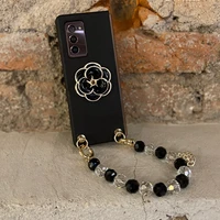 fashion camellia flower stand holder portable pearl beads hand chain leather phone case cover for samsung galaxy z fold 3 2 5g