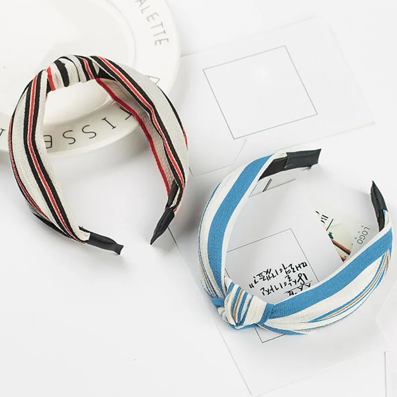 Женская повязка на голову широкая однотонная в цветочек горошек с бантом |