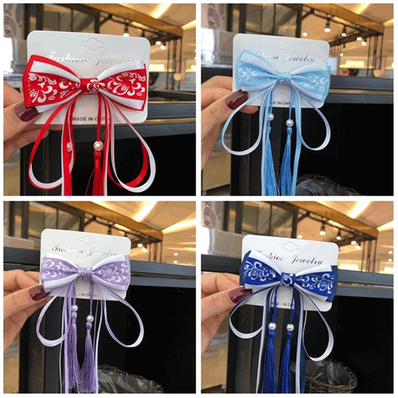 

Chinese hair brand White and Blue Ribbon Tassel Hairpin Hair Clip for Women Girl