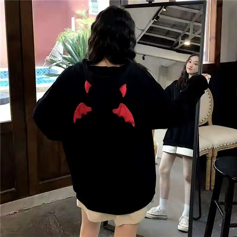 

Elegant lady with long loose and velvet hoodie, pure color long sleeve, chic coat, medium length and large size for autumn/winte