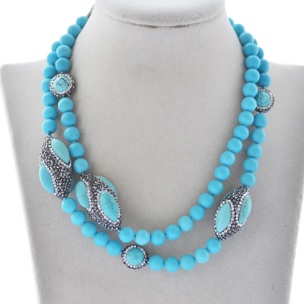 

Z10565 32" 35mm Blue Round Turquoise Shuttle CZ Necklace