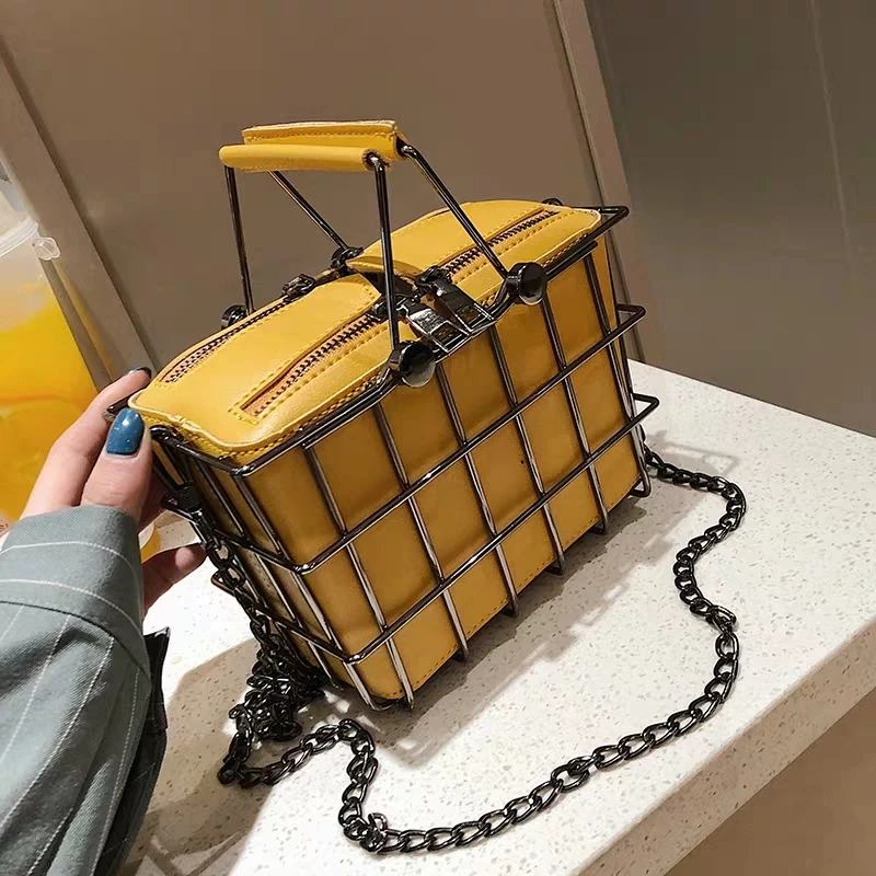 Дизайнерская женская сумка с металлической рамкой модная маленькая сумочка