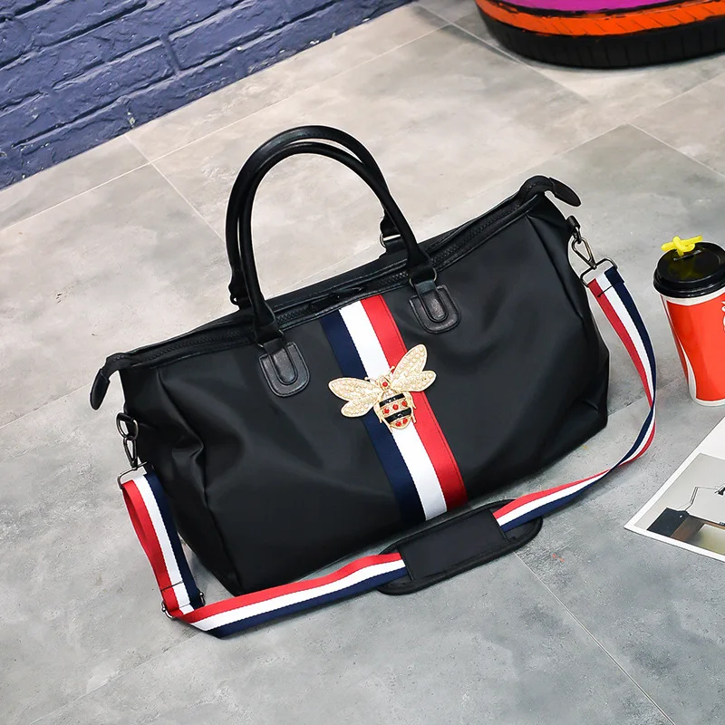 

2021 Fashion black Travel Bags WaterProof Large Capacity Hand Luggage Traveling Bee Bag Women Weekend Travel Duffle Bag Handbags