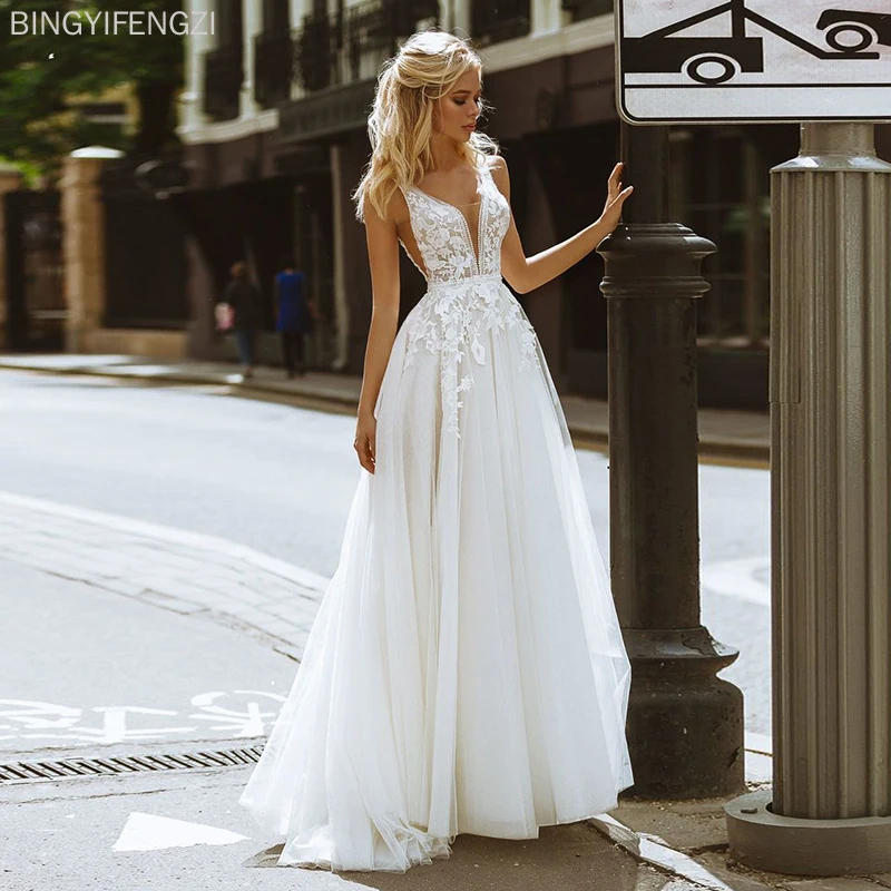 2021 Elegant Simple Deep V-neck Wedding Dresses Appliques Lace A-line Tulle Wedding Gown Beach Bridal Dress Train Silhouette
