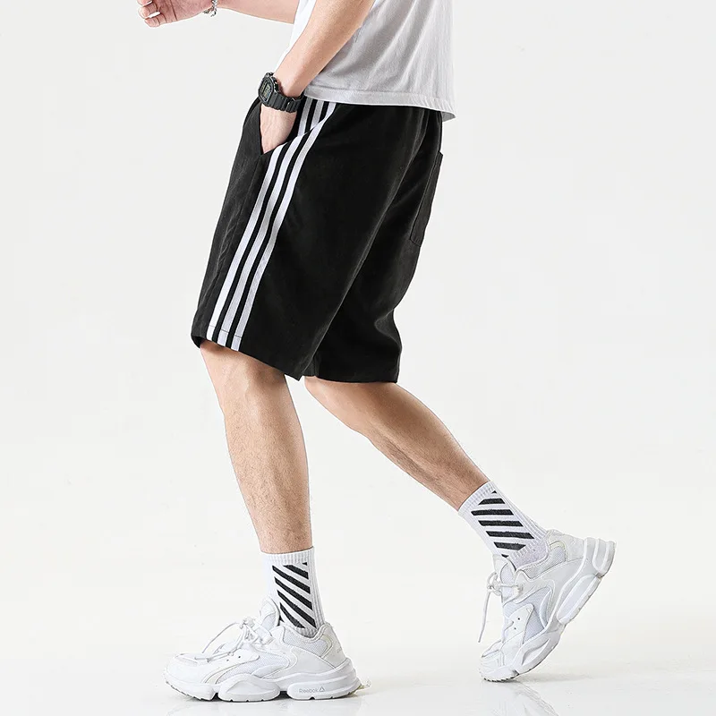 

Новые мужские повседневные шорты Корейская версия модных брюк летние свободные спортивные пляжные брюки для мальчиков с большой вентиляци...