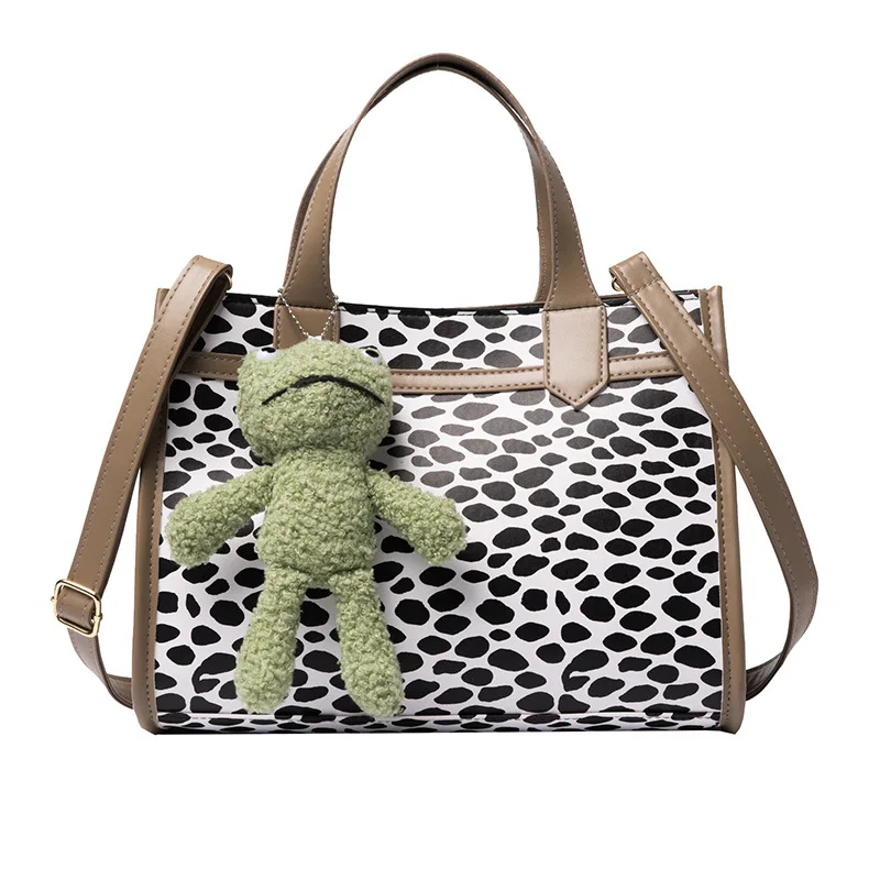 

On the new retro casual portable new fashion plaid shoulder bag large capacity women's bag Joker support