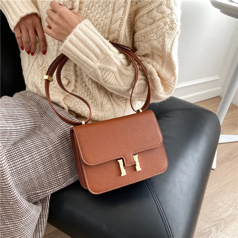 

2021 new h-button hand-held Bag Fashion stewardess bag small women's bag tofu bag women's one shoulder oblique boast bag