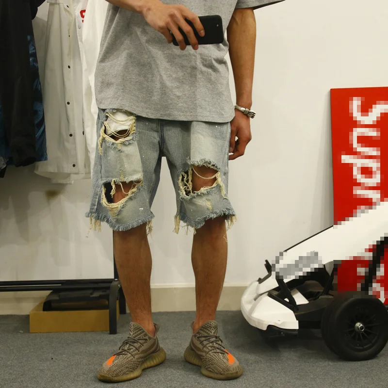 

Retro Wash And Make Old Ripped Denim Shorts Men Casual Loose Big Hole Male Short Jeans Hip Hop Knee Length Shorts