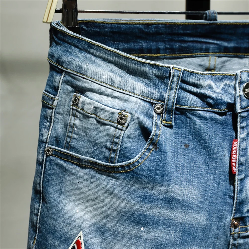 EH · MD® Paint Splashing Jeans Men's Hole Micro-chapter Embroidery Soft Cotton Elastic Leather Label Slim Pants Red Ears 2022