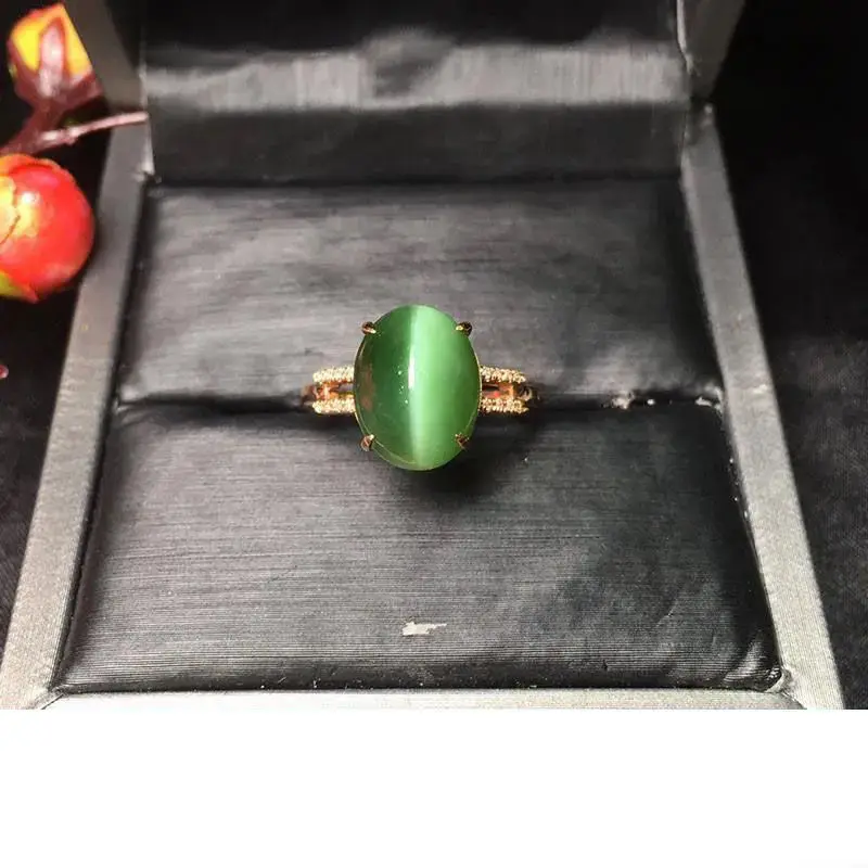 Женское кольцо кошачий глаз из серебра 925 пробы с натуральным зеленым камнем |