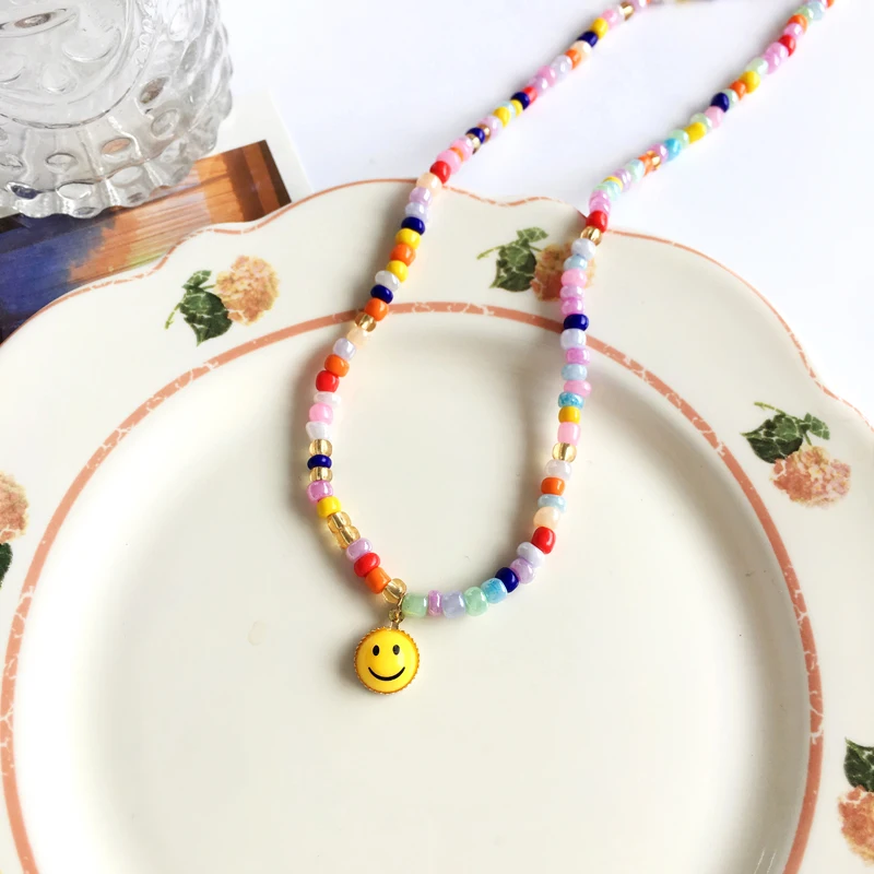 

Popular Style Colorful Seadbeads Necklace Hot Sale Sweet Design Single One Layer Bohemia Smile Face Pendant Necklace For Girls