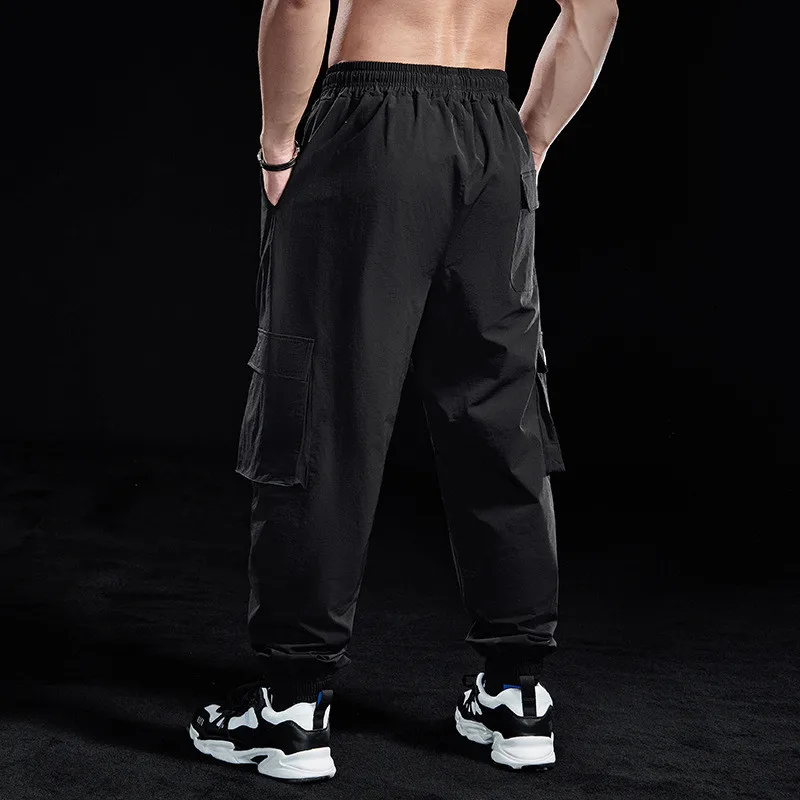 

Sports Pants Muscle Men Fashion Leisure Fitness National Bundle Mouth Joker Fashion Running Cargo Pants Loose Stretch Pants