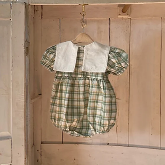 

2021 Korean version children's summer thin style large lapel plaid baby jumpsuit female baby triangle climbing suit