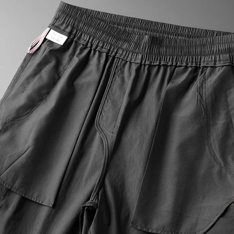 

Summer new light luxury Tencel jacquard casual pants men's simple versatile pants men's pants early autumn