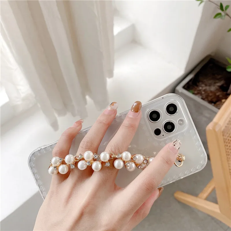 

Love Heart Transparent Bracelet Phone Case For iPhone 12 11 Pro Max X XR 7 8 Plus SE 2020 Metal Pearl Wrist Chain Soft TPU Cover