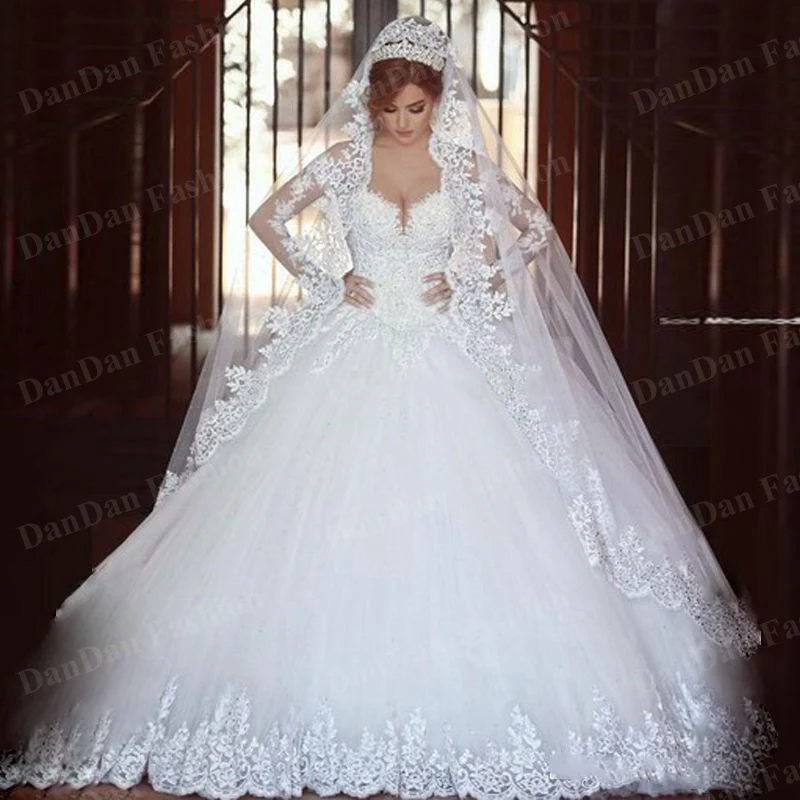 

White Tulle Ball Gown Wedding Dresses Illusion Long Sleeves Off Shoulder Lace Appliques Train Bridal Gowns Vestidos de Novia