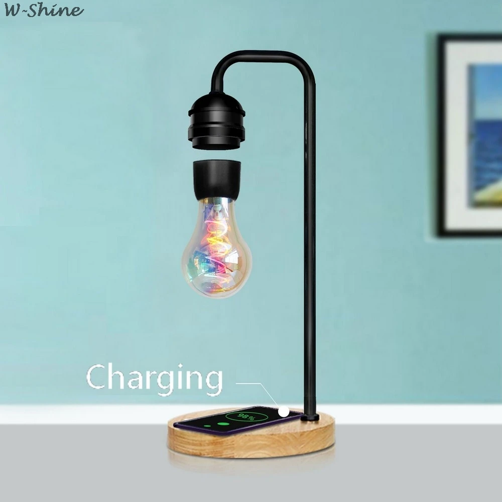 Novelty LED Magnetic Levitation Bulb Hover Floating Desk Lamp Magic Black Tech Wireless Charger for Phone Christmas Gift