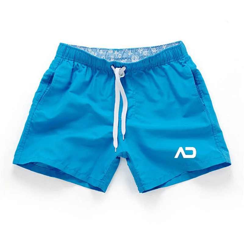 Мужские пляжные шорты с заниженной талией зеленые однотонные дышащие плавки