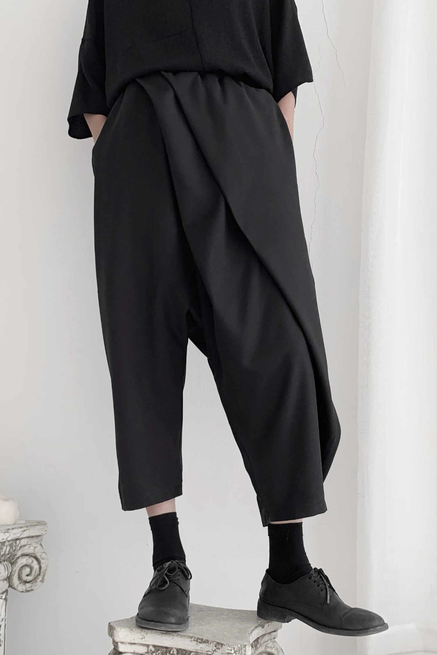 Dark Yamamoto Haute couture with irregular pleated Harem pants and slacks