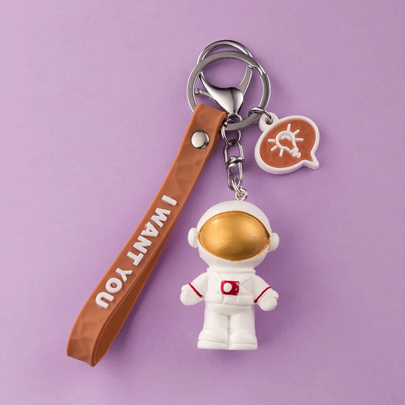 

Resin Astronaut Doll Keychain Gold Silver Blue Pendant Personality Car Bag Cute Male Female Keyring Bag Ornament Toy Lanyard