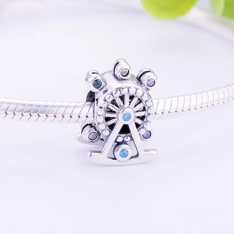 Синий циркониевый камень с колесиком обозрения подходящий для оригинального