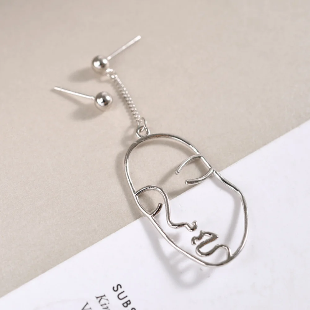 Женские абстрактные асимметричные серьги длинные висячие в форме лица (золотые) |